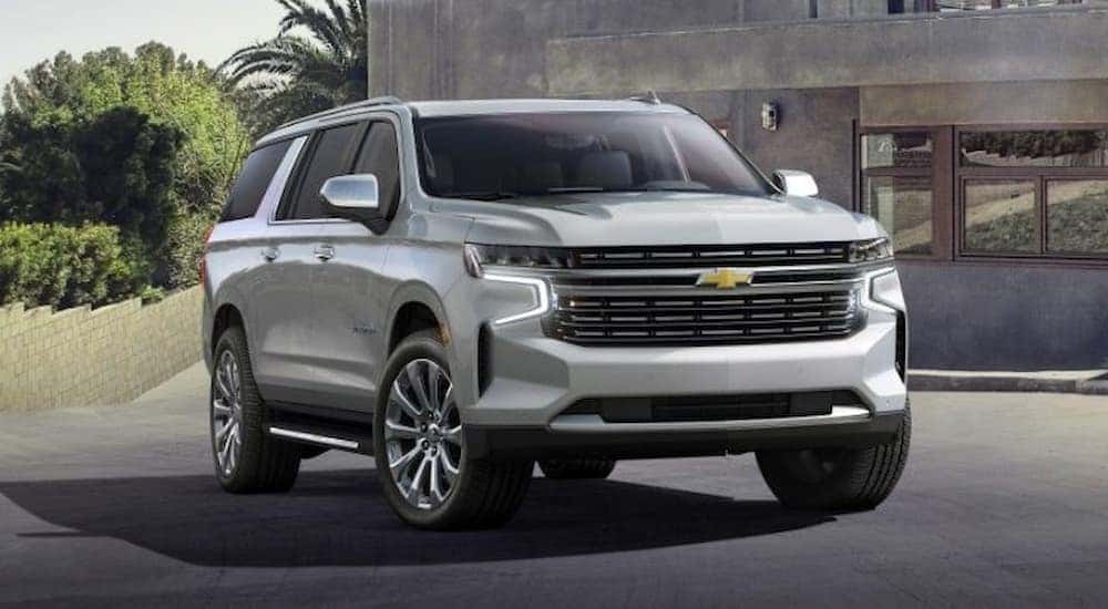 A 2021 Chevy Suburban is shown parked on a driveway.