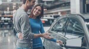 A couple is shown shopping for a vehicle at DePaula Chevy.