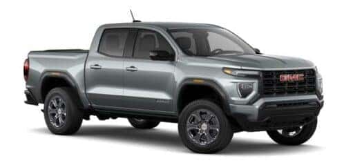 A grey 2023 GMC Canyon is shown angled right.