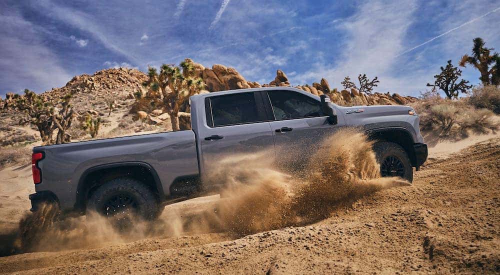 Grey 2024 Chevy Silverado 2500 HD ZR2 for sale off-roading