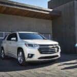 A white 2021 Chevy Traverse is shown from the front at an angle.