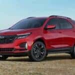 A red 2023 Chevy Equinox RS is shown from the front at an angle.