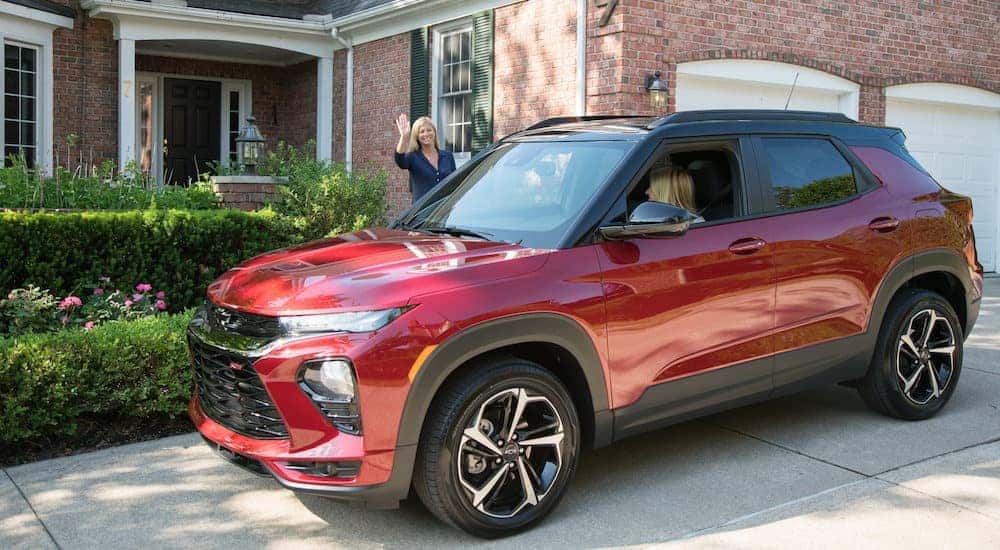 A red 2021 Chevy Trailblazer RS is shown from the front at an angle after leaving a Chevy dealer near Catskill.