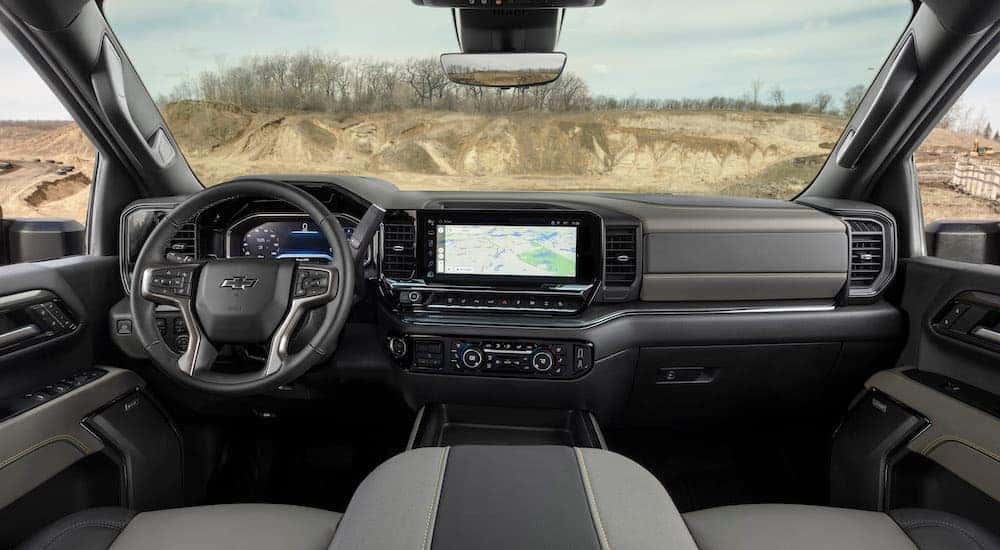 The grey interior of a 2024 Chevy Silverado 2500 HD ZR2 is shown from above the center console.