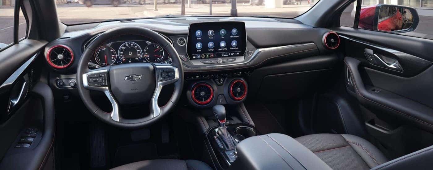 The interior is shown in a red 2024 Chevy Blazer for sale.
