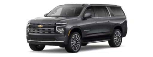 A black 2025 Chevy Suburban is shown angled left.