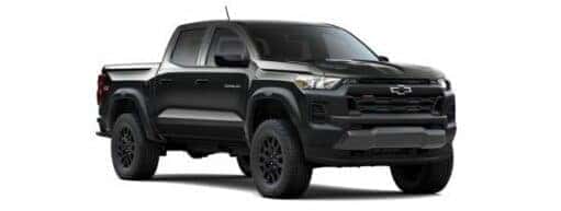 A black 2024 Chevy Colorado Trail Boss is angled right.