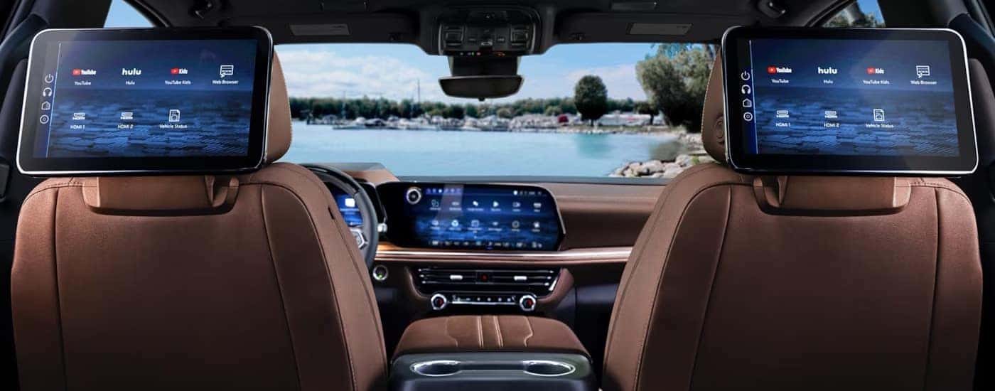 The seat-mounted entertainment screens in a 2025 Chevy Tahoe for sale.