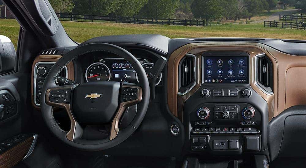 The brown and black interior of a used 2021 Chevy Silverado 1500 for sale.