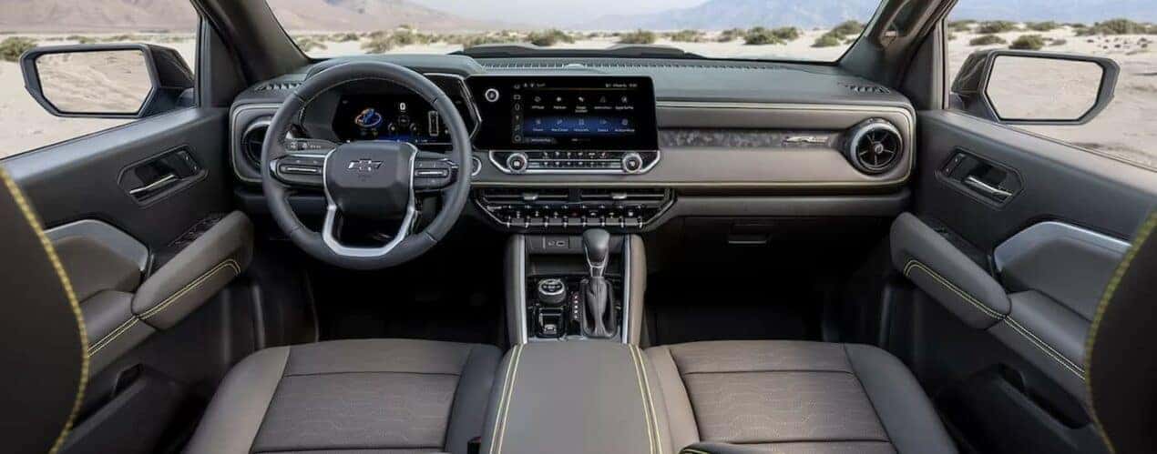 The gray interior and dash in a 2024 Chevy Colorado ZR2 is shown.