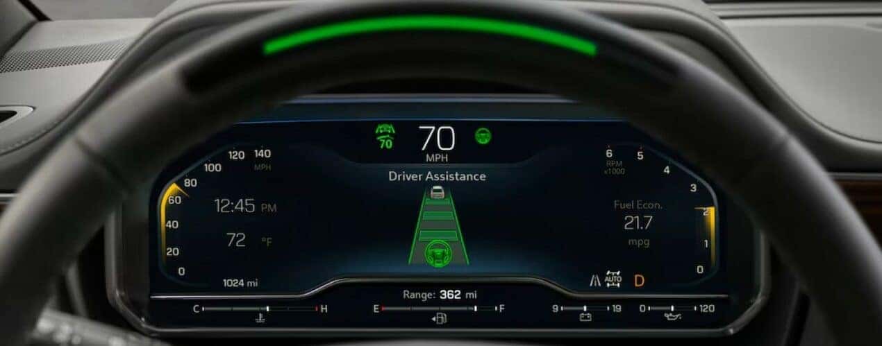 A close-up of the digital dash display is shown in a 2024 Chevy Tahoe.