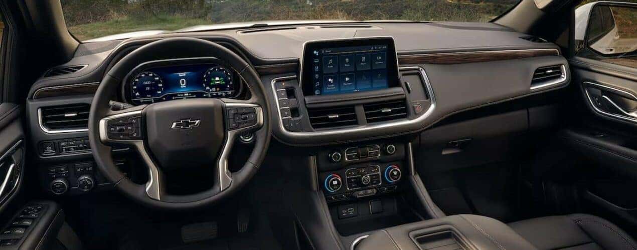 The gray interior and dash in a 2024 Chevy Tahoe is shown.