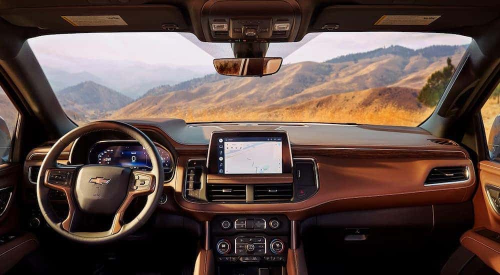 The brown leather interior of a 2024 Chevy Tahoe High Country.