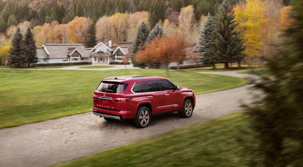 Rear view of a red 2024 Toyota Sequoia Capstone.