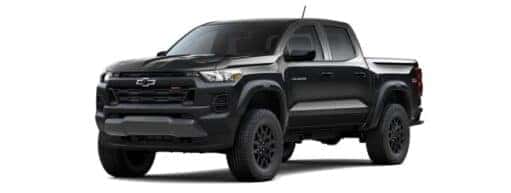 A black 2024 Chevy Colorado Trail Boss is angled left.