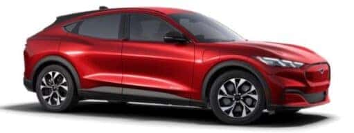 A red 2024 Ford Mustang Mach-E is angled right.