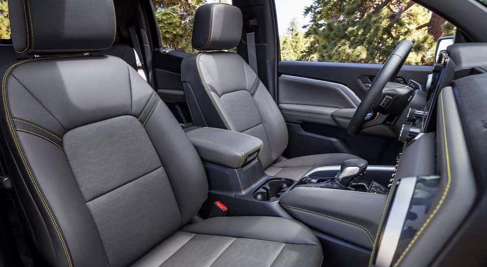 The gray interior and dash in a 2024 Chevy Colorado is shown.