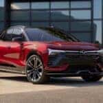 A red 2024 Chevy Blazer EV RS is shown from the front at an angle.