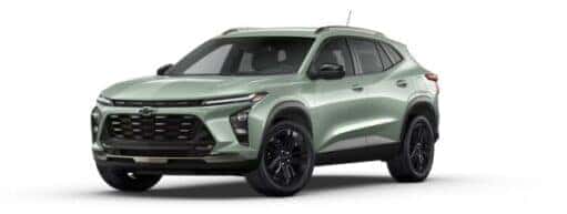 A green 2025 Chevy Trax ACTIV is angled left.