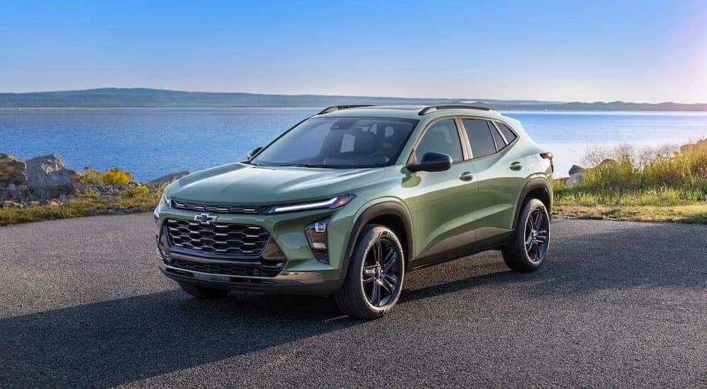 A green 2025 Chevy Trax ACTIV is shown from the front at an angle.