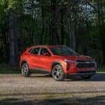 An orange 2025 Chevy Trax for sale near Ballston Spa is shown from the front at an angle.