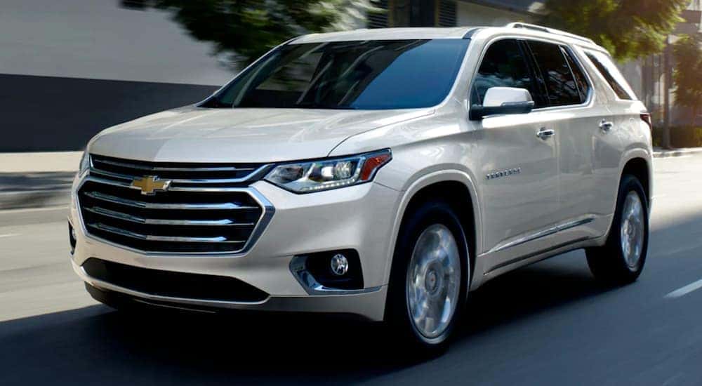 A white 2021 Chevy Traverse is shown from the front at an angle.