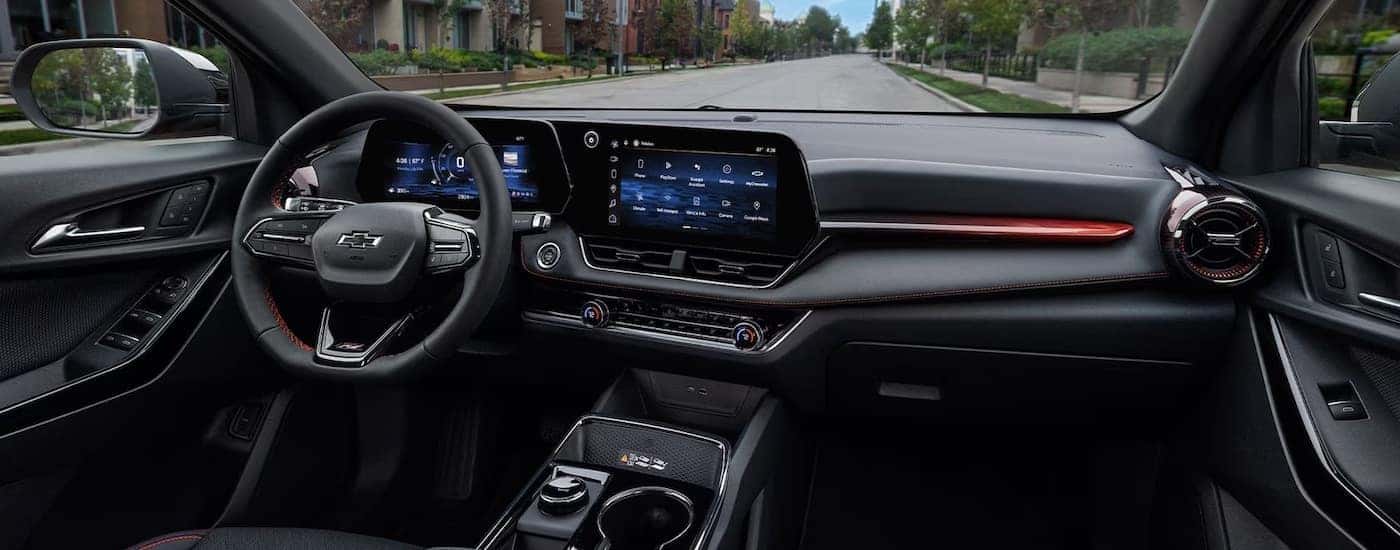 The black interior cabin of a 2025 Chevy Equinox.