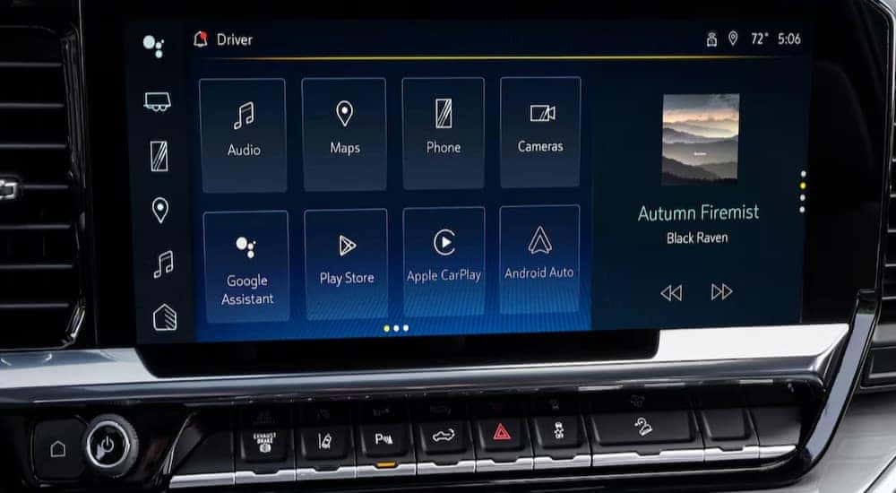 A close-up of the infotainment screen is shown in a 2025 Chevy Silverado 2500 HD.
