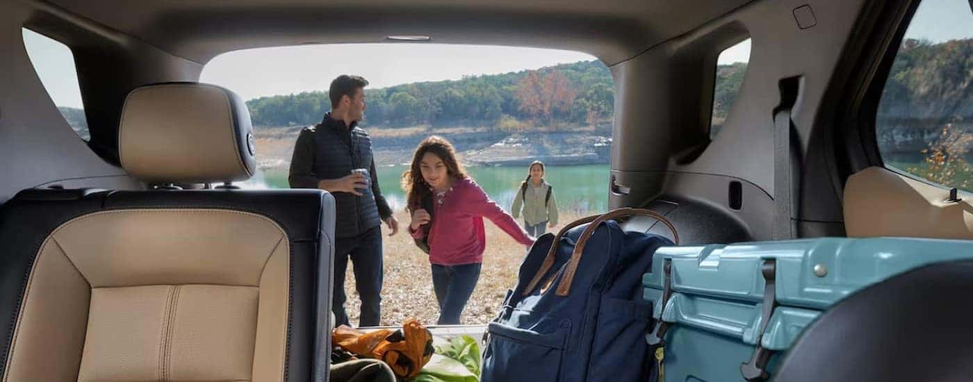 The rear cargo area is shown in a 2024 Chevy Equinox LS.