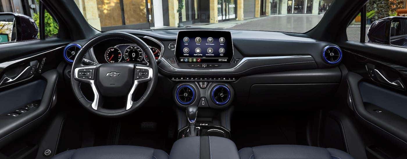 The black interior of a 2025 Chevy Blazer is shown from above the center console.