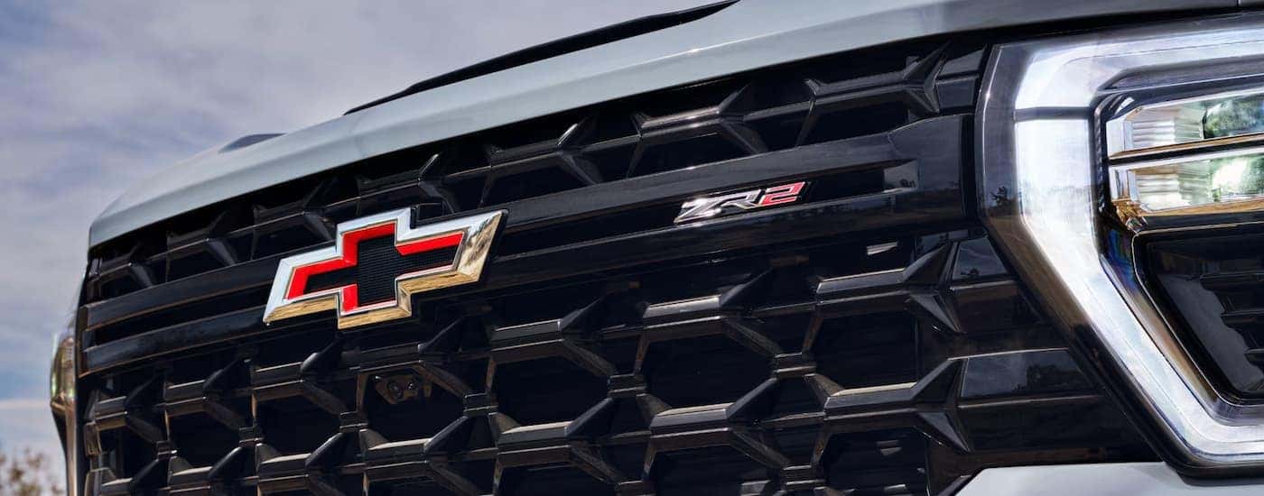 A close up of the grille on a grey 2025 Chevy Silverado 2500HD ZR2.