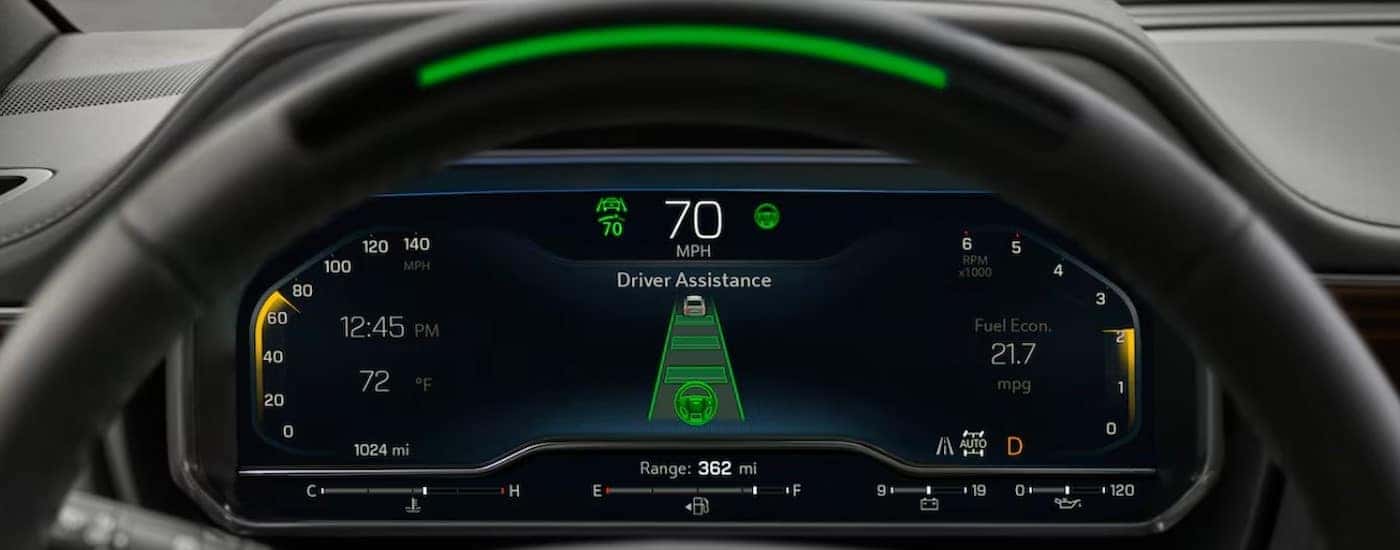 The digital dash display is shown in a 2024 Chevy Tahoe for sale near Colonie.