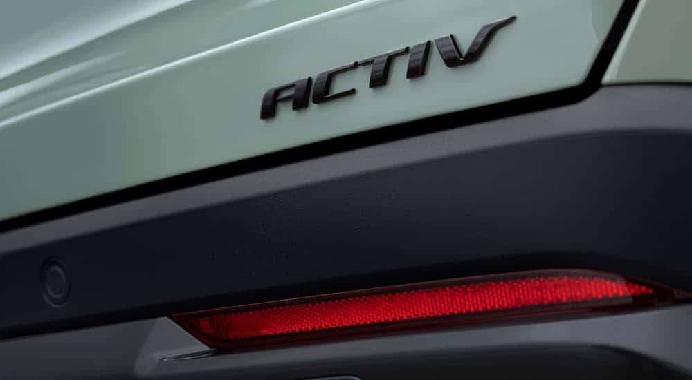 The rear badge on a green 2025 Chevy Equinox ACTIV.