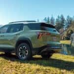 Kids are running near a 2025 Chevy Equinox ACTIV.