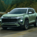 A red 2025 Chevy Equinox ACTIV driving around a bend
