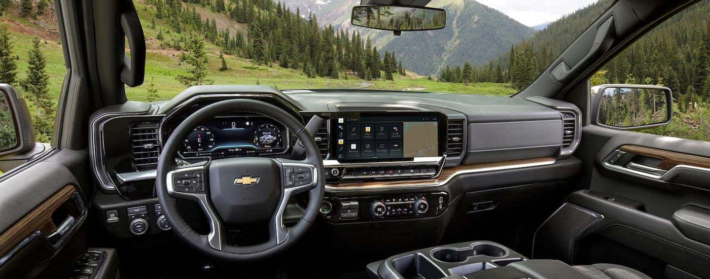 The black interior of a 2025 Chevy Silverado 1500 for sale near Schenectady is shown.