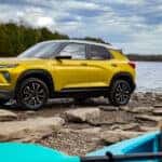 A yellow 2025 Chevy Trailblazer for sale near Amsterdam from the side.