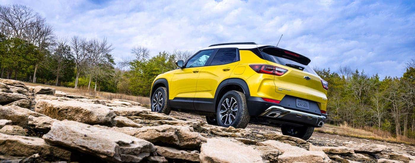 A yellow 2025 Chevy Trailblazer from the rear.