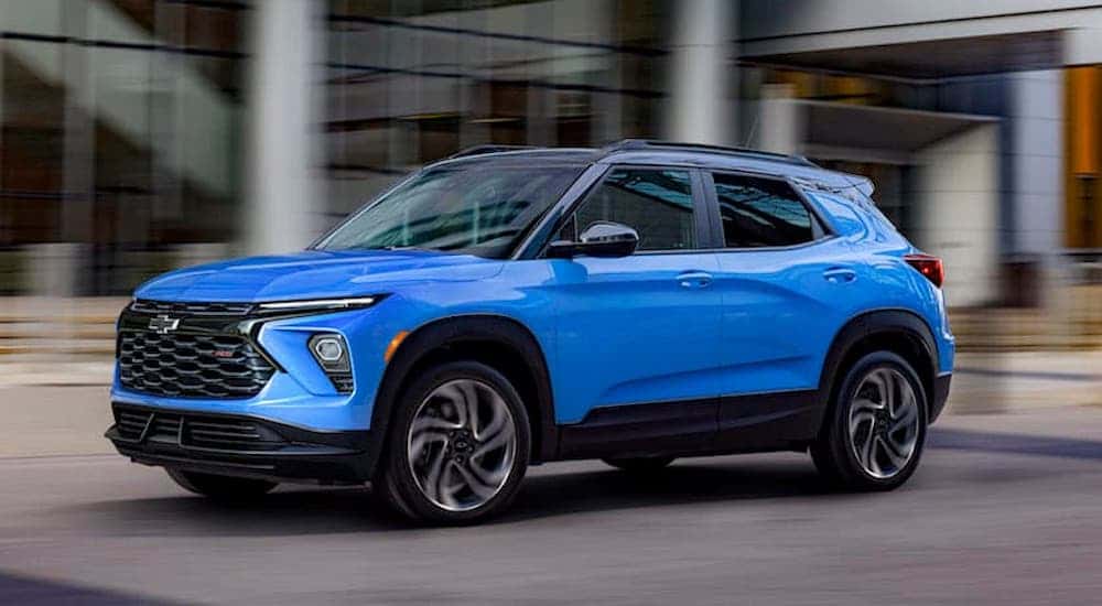 A blue 2025 Chevy Trailblazer from the side.