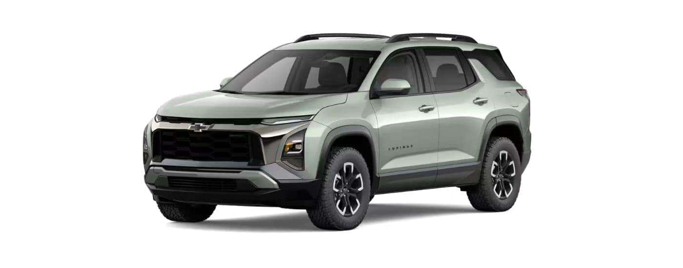 A green 2026 Chevy Equinox angled left.