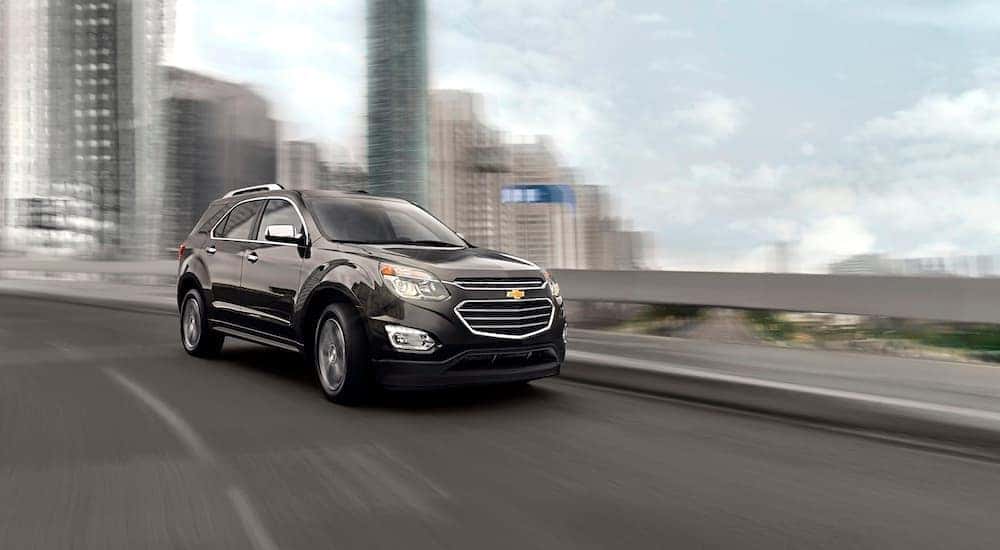 Black 2016 Chevy Equinox for sale on a test drive.