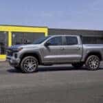 A silver 2025 Chevy Colorado from the side.