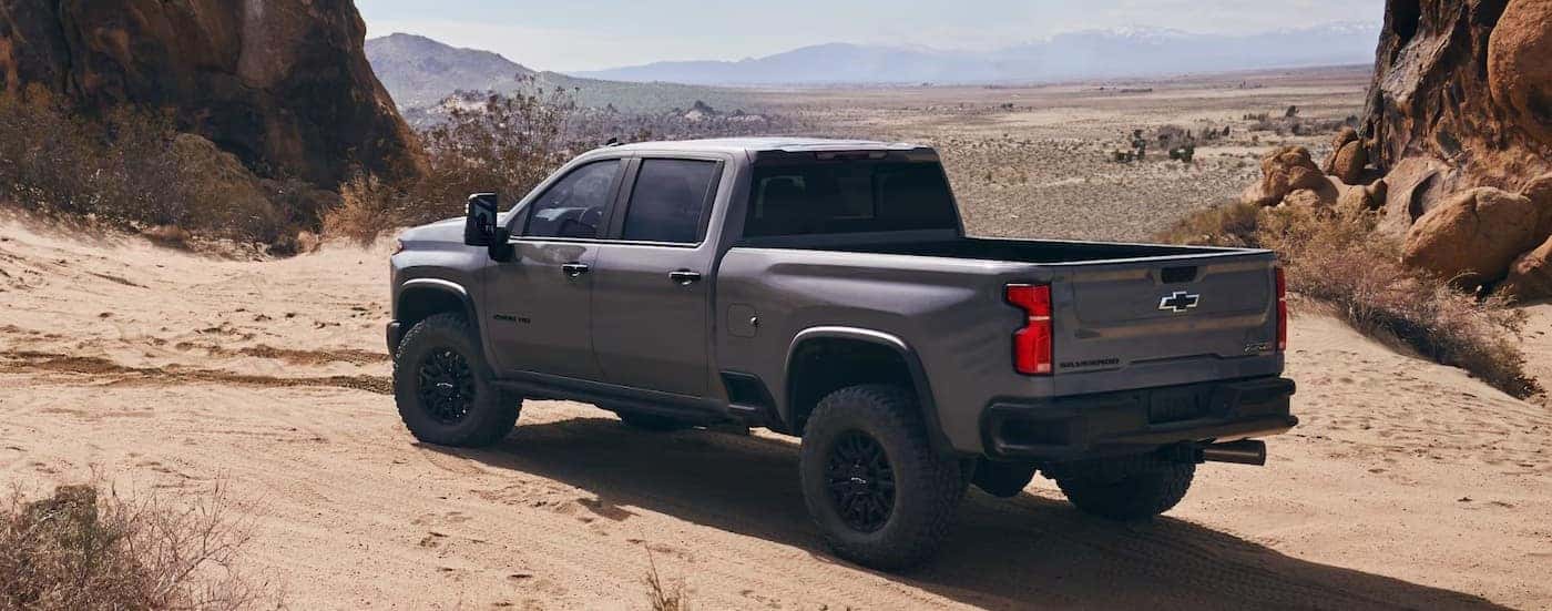 A gray 2025 Chevy Silverado 2500 HD ZR2 parked off-road.