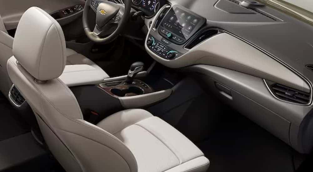 The gray and white interior and dash in a 2024 Chevy Malibu.