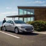 A parked silver 2025 Chevy Malibu for sale near Latham.