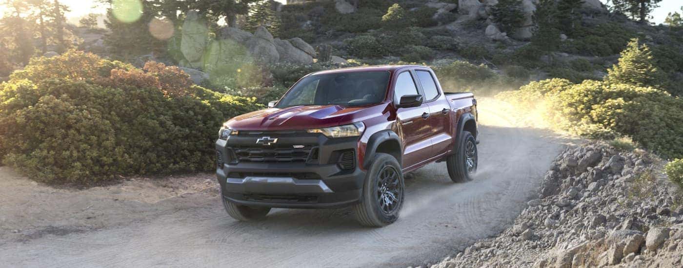A red 2025 Chevy Colorado Trail Boss off-roading