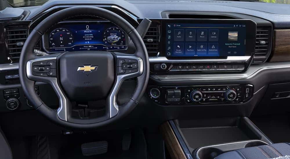 Infotainment and digital gauge cluster on a 2025 Chevy Silverado 3500 HD vs 2025 Ford F-350