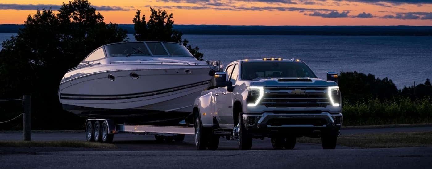 A white 2025 Chevy Silverado 3500 from the front at an angle.