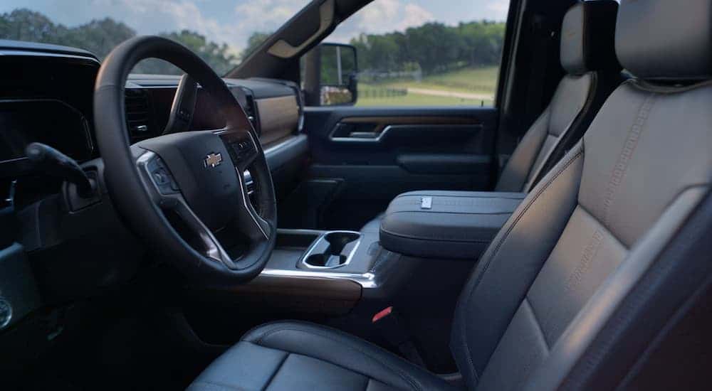 Black leather interior of a 2025 Chevy Silverado 3500 for sale in Albany