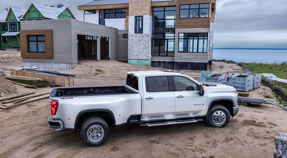 A white 2025 Chevy Silverado 3500 parked at a construction site